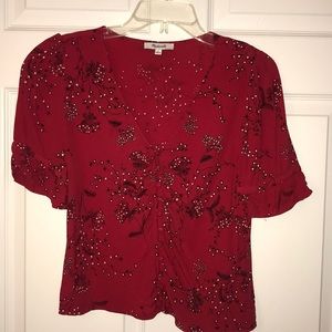 Red floral blouse